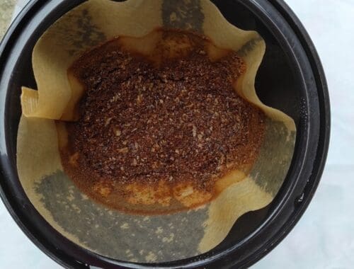 wet coffee grounds in a filter.